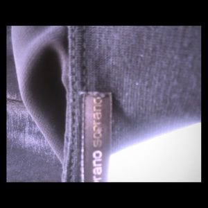 Cutest tight black dress with a ruffle top.